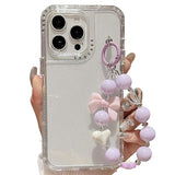 iPhone 16 Pro Max Glitter stødsikkert hybrid cover med håndledsrem - gennemsigtig