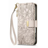 iPhone 16 Pungetui med blomster- og bladmønster med lynlåslomme og håndledsrem - hvid