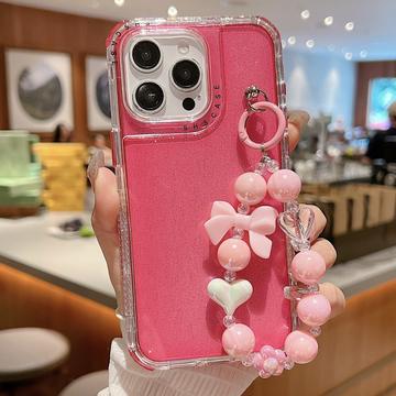 iPhone 16 Pro Glitter stødsikkert hybrid cover med håndledsrem - Hot Pink