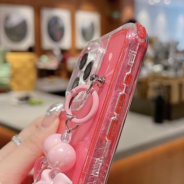 iPhone 16 Pro Glitter stødsikkert hybrid cover med håndledsrem - Hot Pink