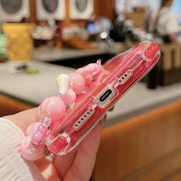 iPhone 16 Pro Glitter stødsikkert hybrid cover med håndledsrem - Hot Pink