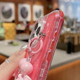 iPhone 16 Pro Max Glitter stødsikkert hybrid cover med håndledsrem - Hot Pink