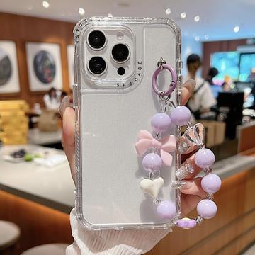 iPhone 16 Pro Max Glitter stødsikkert hybrid cover med håndledsrem - gennemsigtig