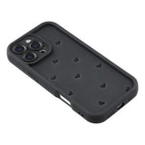 iPhone 16 Pro Max stødsikkert TPU-cover med hjertemønster og forhøjede kanter - sort